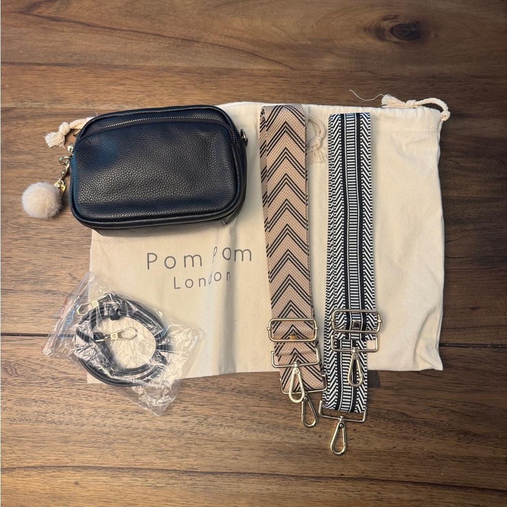 Pom Pom Original Bag, Black leather. Excellent condition. 3 straps, keyring.